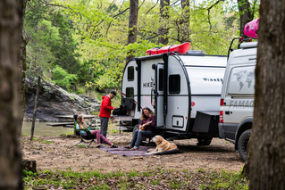 Winnebago-camping-by-the-river.jpg