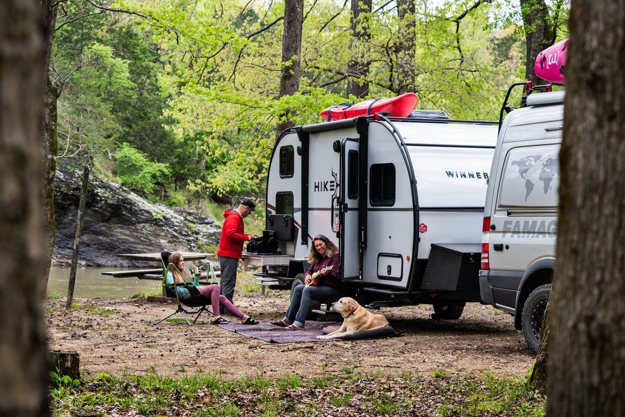 Winnebago-camping-by-the-river.jpg